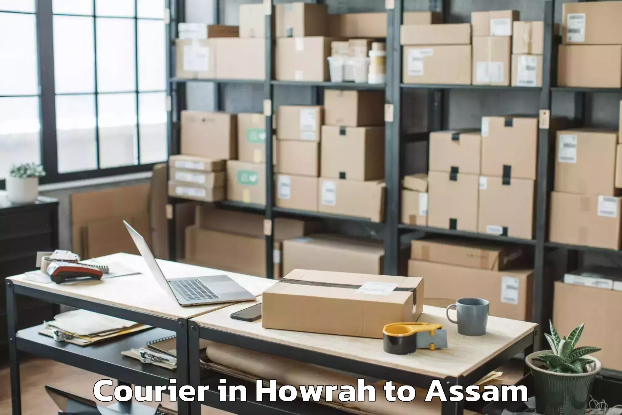 Book Howrah to Bajali Courier Online